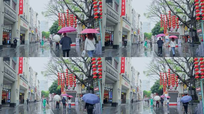 4K实拍，春雨中广州北京路步行街的行人。