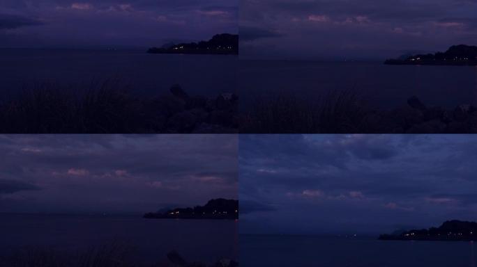 夜晚海面上的紫云