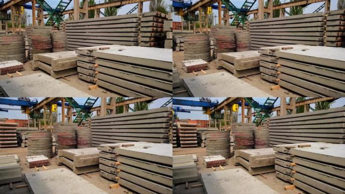 不同形状和尺寸的钢筋混凝土材料。用于提升砖块和砌块的金属支架、梯子和起重机。