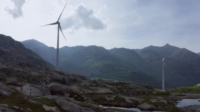 瑞士圣哥达山口的风力涡轮机和大坝，无人机
