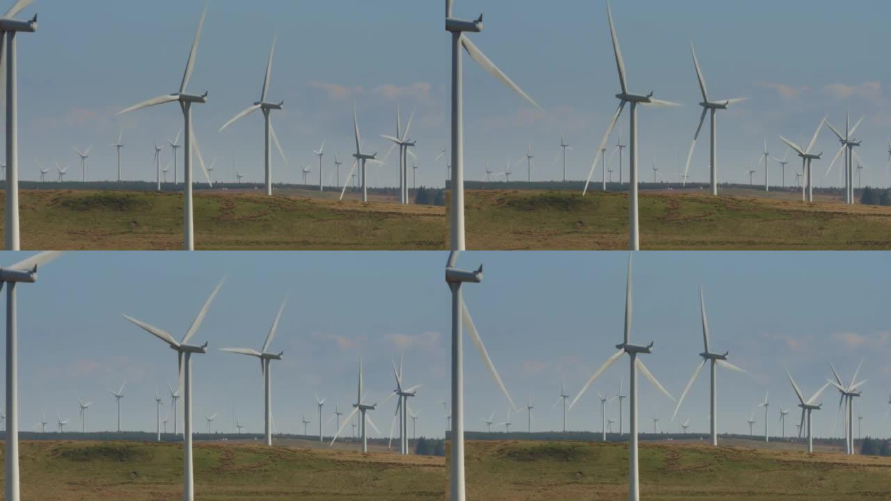 陆上风力涡轮机的视图，可产生清洁的可再生无碳能源，以帮助达到净零