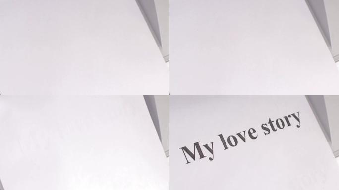 我的爱情故事，办公室打印机在一张白纸上打印，特写，俯视图。