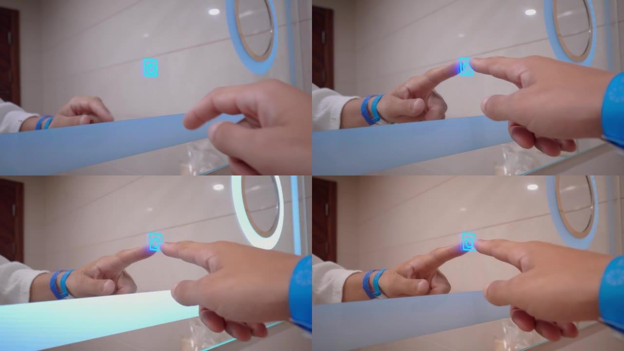 用手指触摸镜子显示屏上的发光按钮。