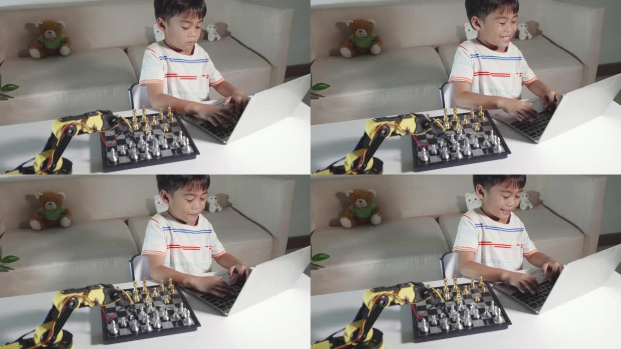 亚洲小男孩编程代码机器人机器手臂上的笔记本电脑下棋
