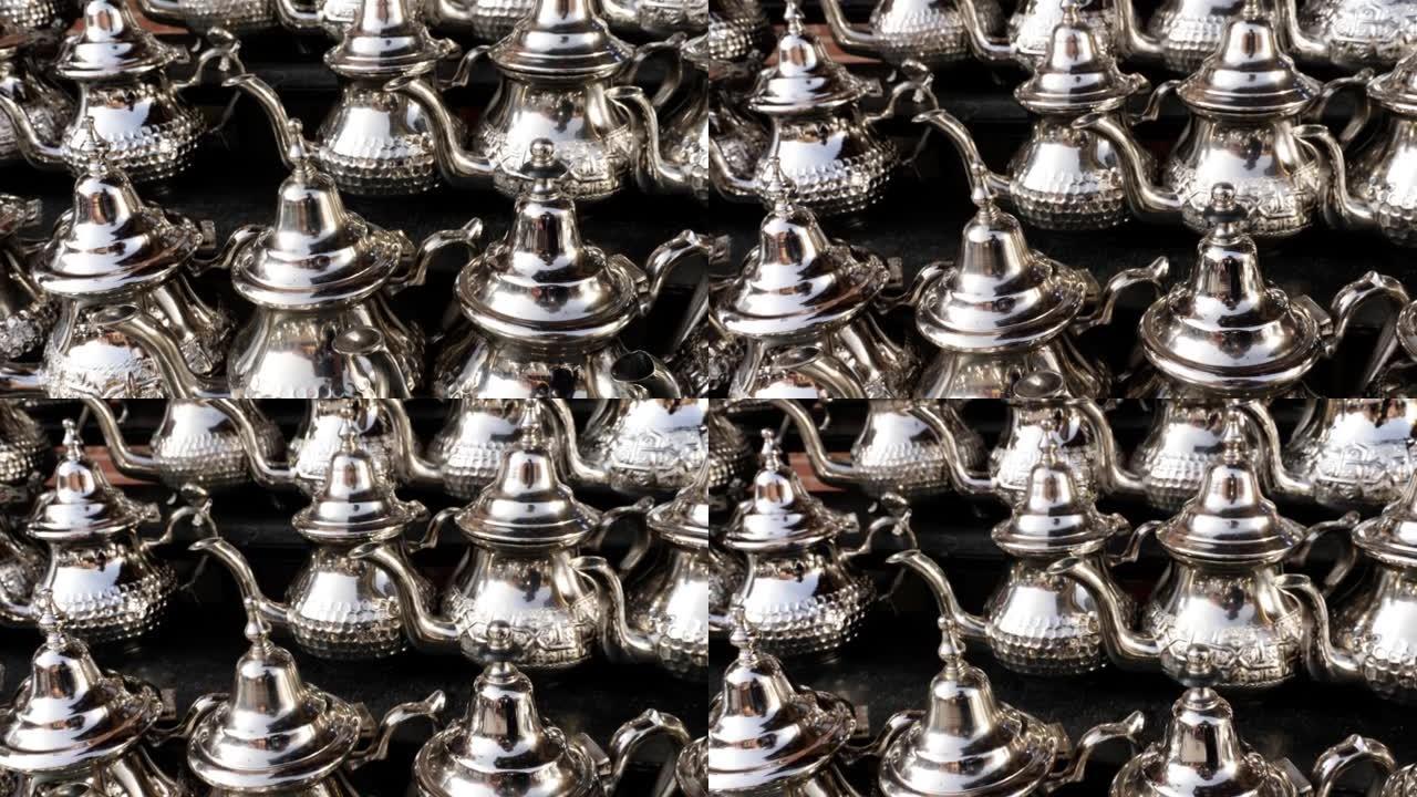 摩洛哥马拉喀什麦地那露天市场的一家商店里的传统摩洛哥茶壶。