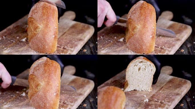 烹饪过程中将新鲜的黑麦面包切成小块