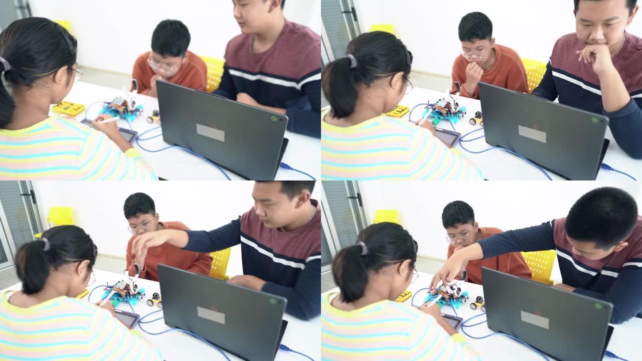 学生和朋友在教室里学习机器人技术