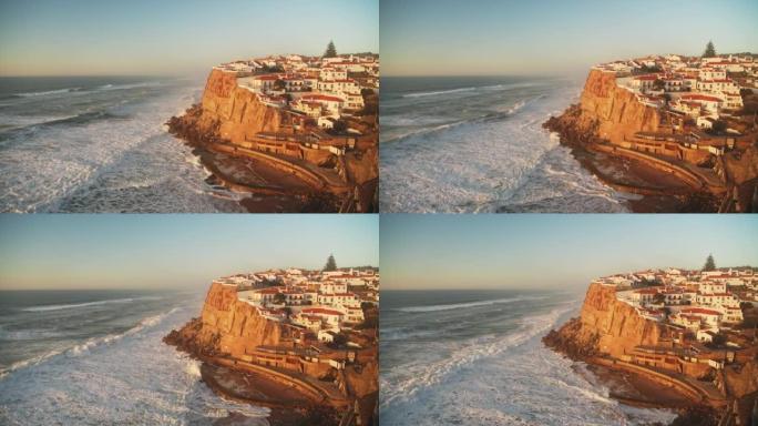 葡萄牙沿海城镇的空中无人驾驶飞机视图，在欧洲里斯本的辛特拉的住房市场，悬崖顶的房产和海岸的房屋，在普