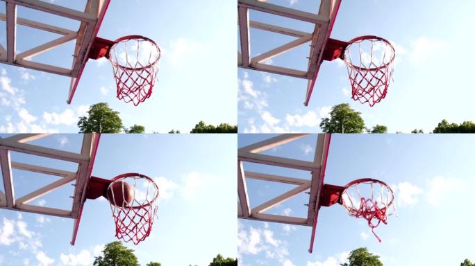 篮球网中的球特写复制太空蓝天