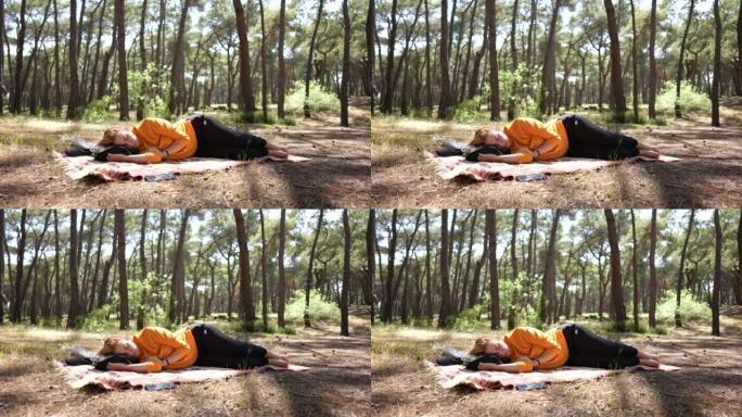 躺在草地上的女人睡在森林里