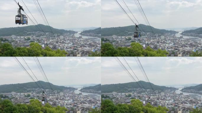 仙光寺山索道上升。在尾道市的背景中