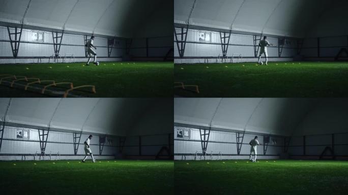 独自在室内体育场进行夜间训练的非裔美国足球运动员，练习运球