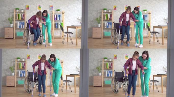 护士帮助一名残疾女孩在受伤后从轮椅上站起来，在事故后康复