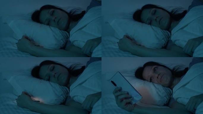 美女摔倒睡觉和摔倒智能手机从手