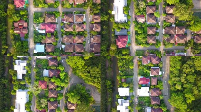 住宅项目顶视图的绿色环保环境包围的郊区无人机拍摄