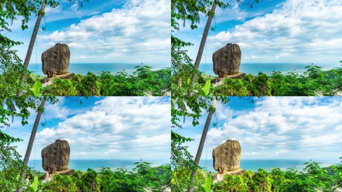 旅行者在泰国苏梅岛的蓝天森林中漫步风景秀丽的石头，重叠的石头