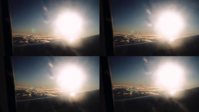 飞机窗口的日落云旅游度假游玩景区