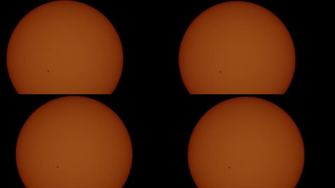 望远镜里有太阳黑子的太阳。太阳斑点闪耀着太阳耀斑。磁暴，晴风全球变暖和污染。太阳辐射。炎热的天气气候