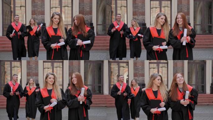 最好的女性开朗的朋友学生参加毕业典礼，穿着毕业礼服，穿着毕业礼服，拿着文凭，以高中大学教育理念为背景