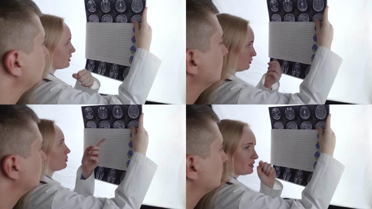 表皮医生检查患者的MRI和脑电图。治疗癫痫和帮助患有这种疾病的人的概念。神经科医生在工作。大脑的病理