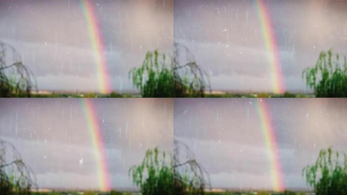 无缝循环背景。美丽的雨后彩虹。自然公园中的彩虹。夏天没有自然景观。雨滴滴落在玻璃上。概念: 视觉循环