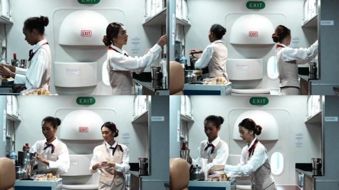 两位亚洲美女空姐为头等舱和商务舱乘客准备食物和饮料。美丽的空中小姐或空乘在飞机上为乘客服务。航空公司