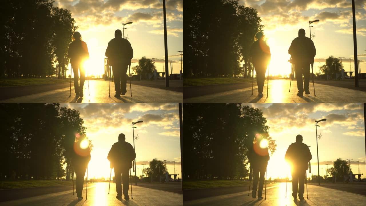 一对老年夫妇在公园里散步，走向日落。一个男人和一个女人用棍子走路来改善健康。