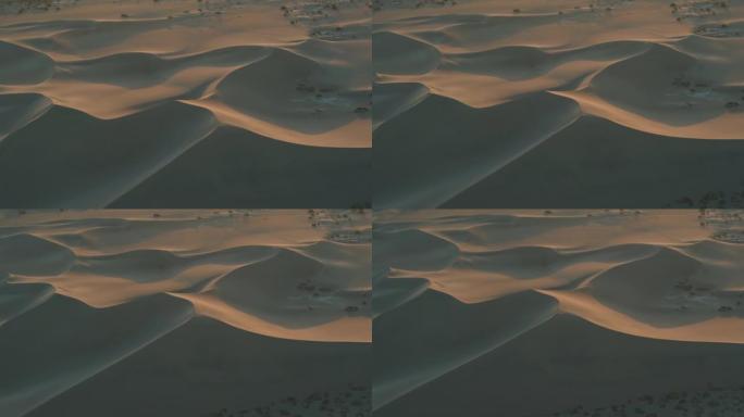 像空中无人机一样的月景，可以看到加利福尼亚死亡谷的侵蚀岩层和沙丘