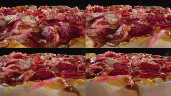 热肉披萨配奶酪、意大利香肠和培根-特写