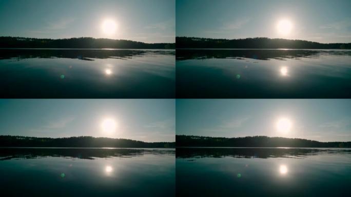 日落时的湖月光月亮圆圆影子水面池塘