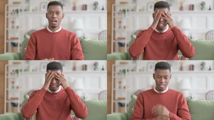 失望的非洲男子对损失的反应的肖像