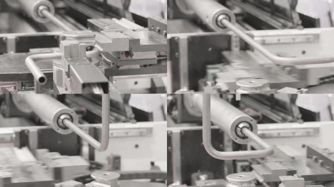工业弯管机设备，用于工厂的金属管弯曲。制造厂工业大厅电子车削金属管冷弯自动金属加工机