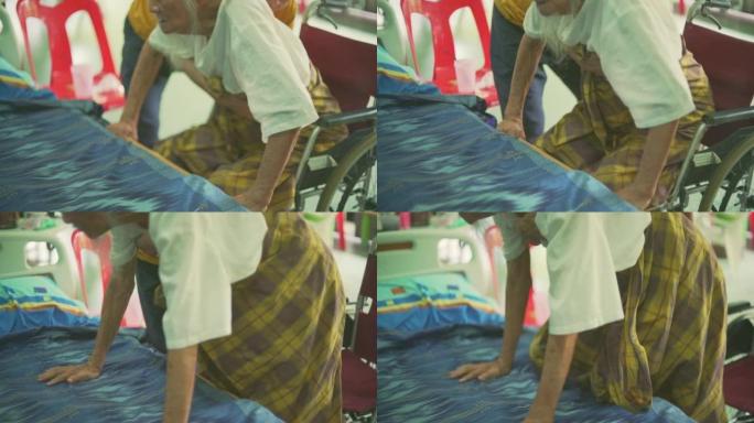 老年妇女帮助老人睡觉睡觉