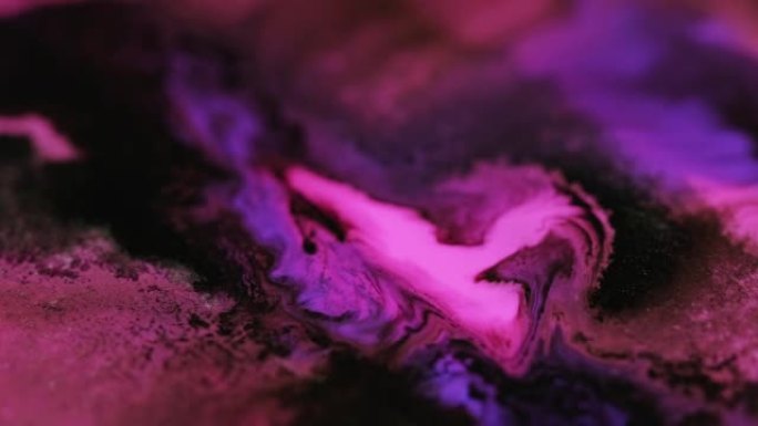 油墨混合纹理彩色流体流动粉色紫色黑色