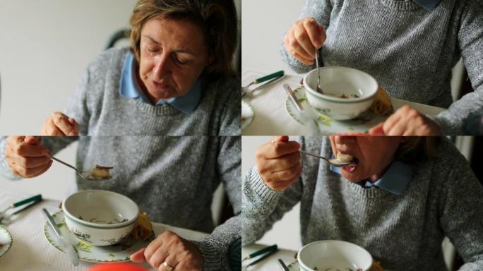 老年人在早餐中吃一碗麦片加牛奶