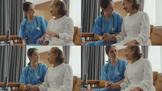 亚洲女性家庭护理员在家照顾老年老年女性患者。