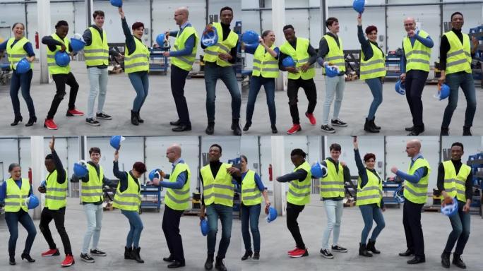 多种族工程师在机器人工厂里跳舞很开心