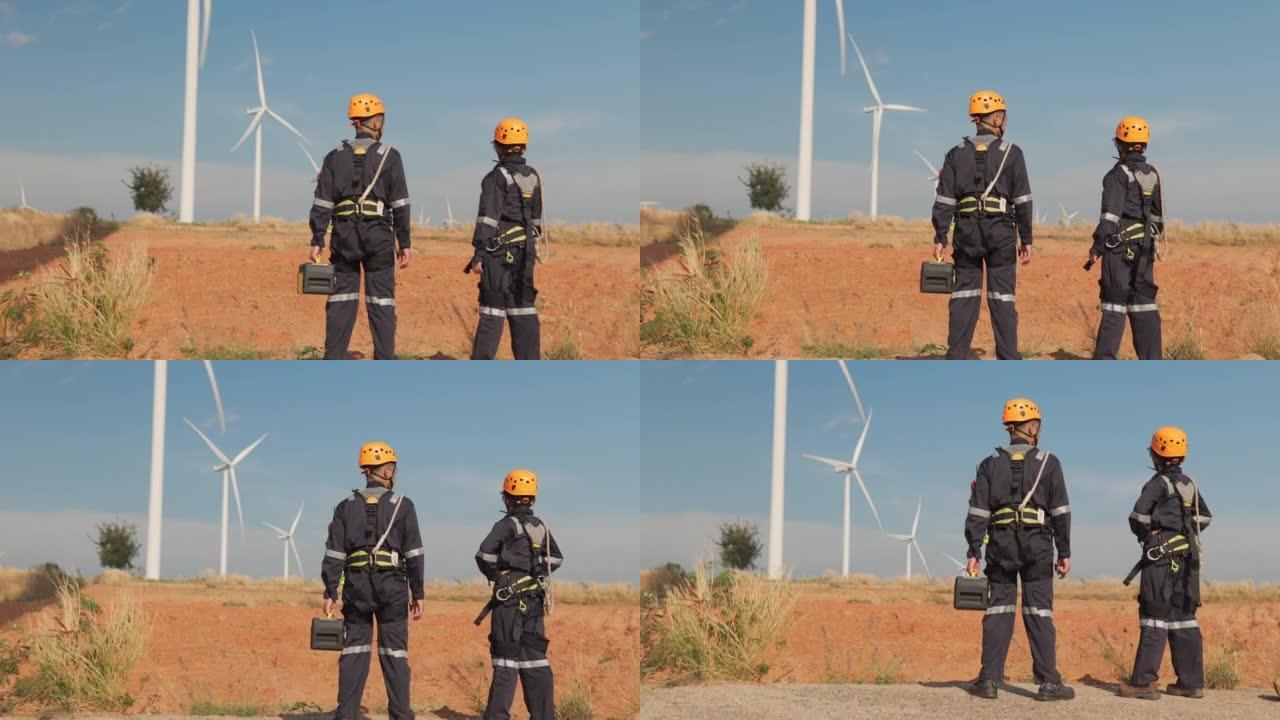 两名工程师检查风力涡轮机