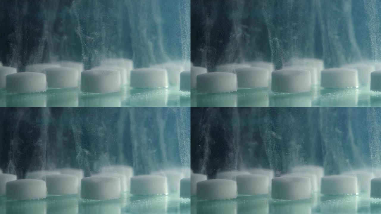 白色药片在水中溶解的特写镜头