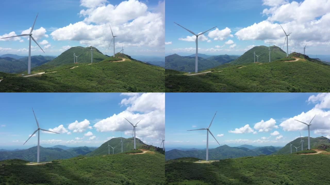 航拍藍天白雲高山風力發電場