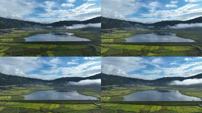 山间蓝色湖泊和金色稻田的延时视频