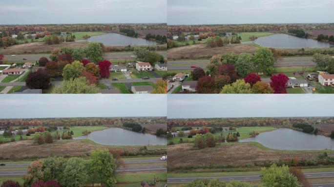 秋季湖边和小镇的无人机镜头