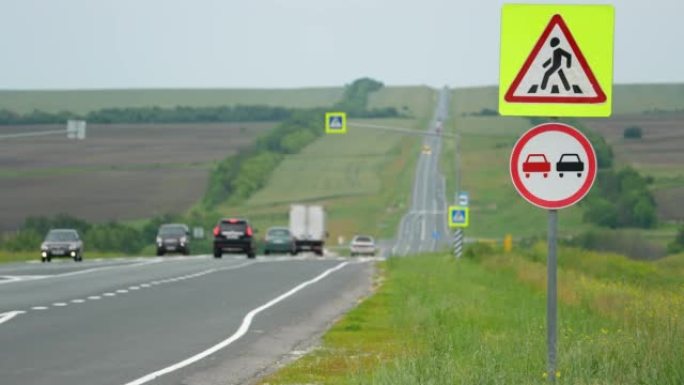 公路上禁止路牌超车。道路安全。罚款。人们的生活