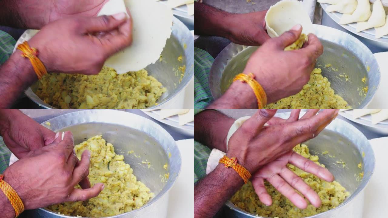 孟买街头食品小贩制作蔬菜Samosa
