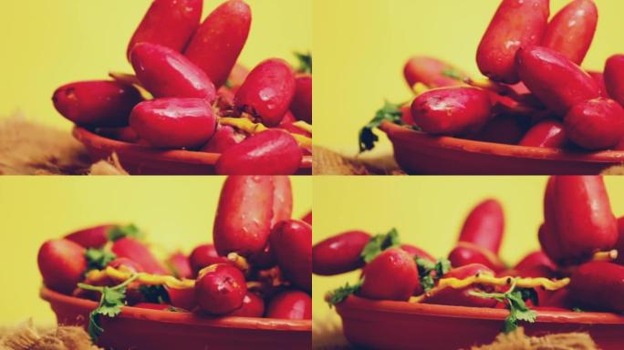 黄色背景上的红色生枣，健康水果