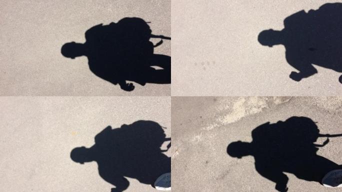 一个行走的人的影子