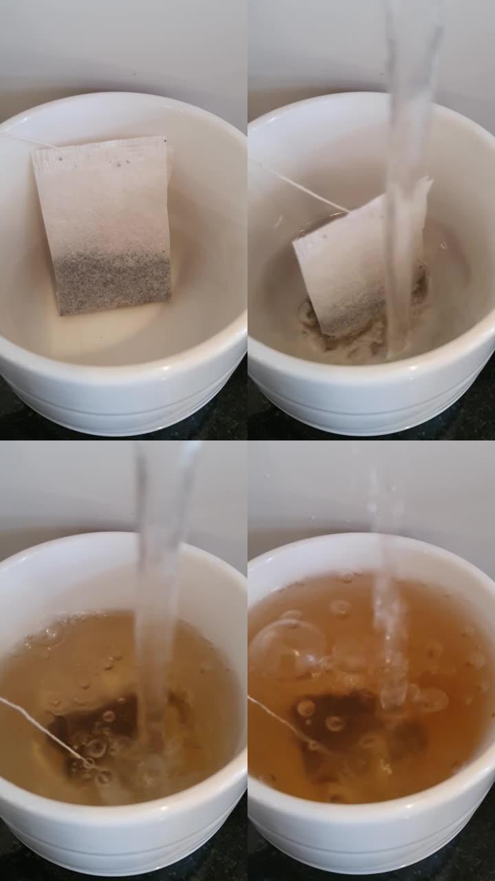 用茶包将热水倒入白色杯子的镜头