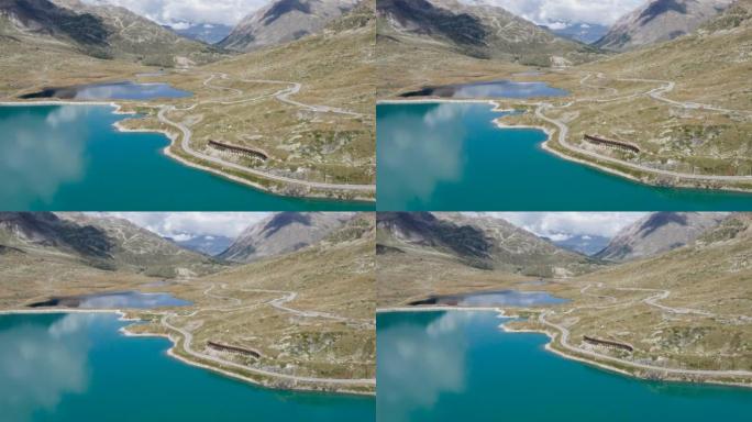 无人驾驶飞机鸟瞰图令人惊叹的瑞士山湖景观。无人机在阿尔卑斯山原始景观上方飞行