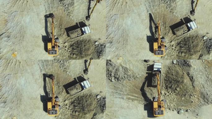 挖掘机铲土到自卸车的俯视图