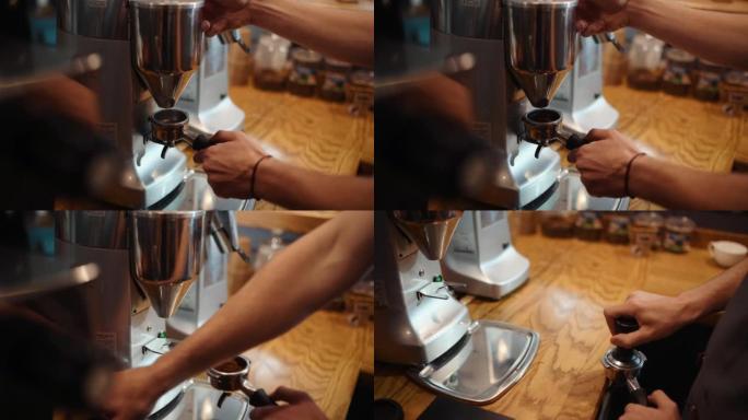使用特殊工具准备咖啡的咖啡馆工人手的特写视图